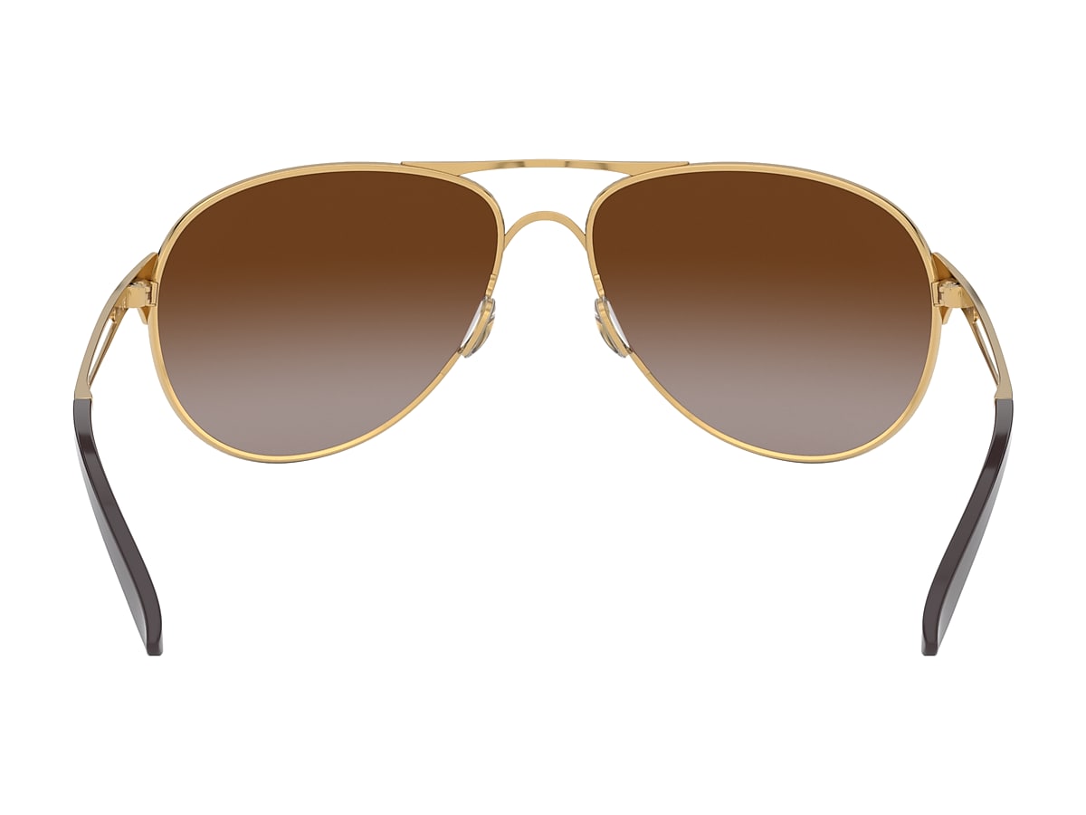 Caveat™ Dark Brown Gradient Lenses, Polished Gold Frame Sunglasses | Oakley®  DK